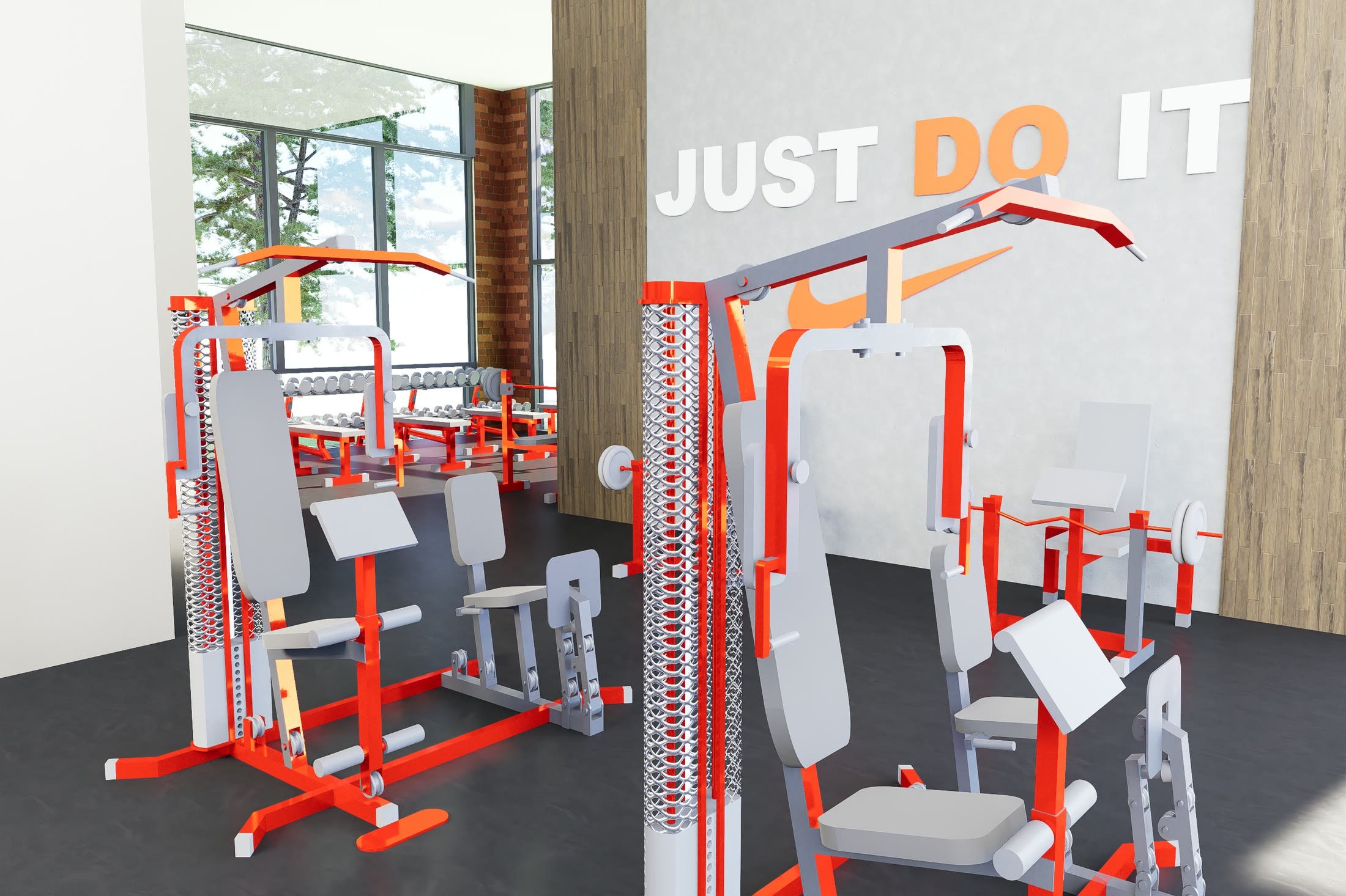 The public gym with resistance machines and graphics on the exposed brick wall