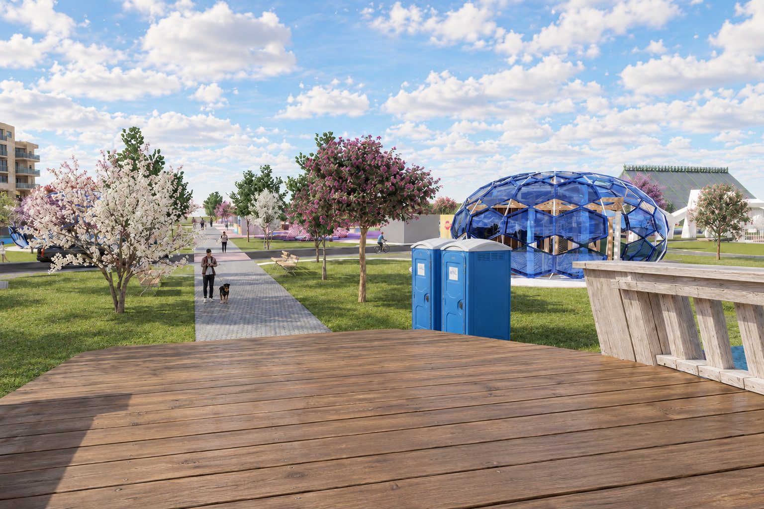 The faceted blue Arch-Flora pavilion seen across the timber deck, with blossoming trees around it